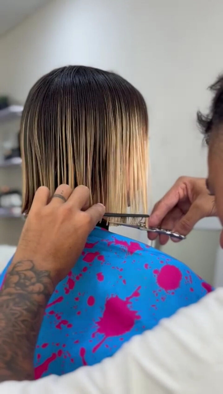 Haircut being finished in the Aurora salon chair